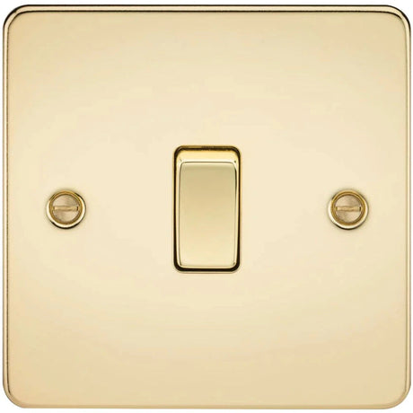 A gold-colored light switch on a square plate with two visible screw heads, one on each side. The switch is positioned in the center of the plate.