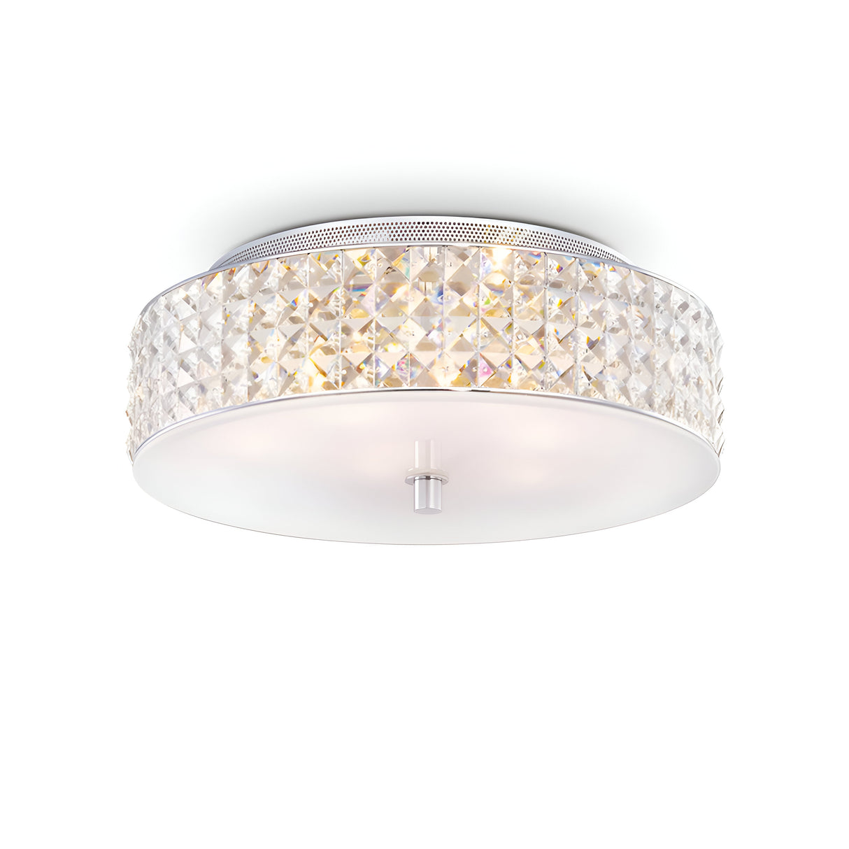 The Nebula 6 Light Crystal Ceiling Light - Chrome is a round fixture with a frosted glass bottom and an elegant band of clear crystal-like elements encircling it. Its design features chromed metal at the center, offering a semi-flush mount that emits a soft, elegant glow.