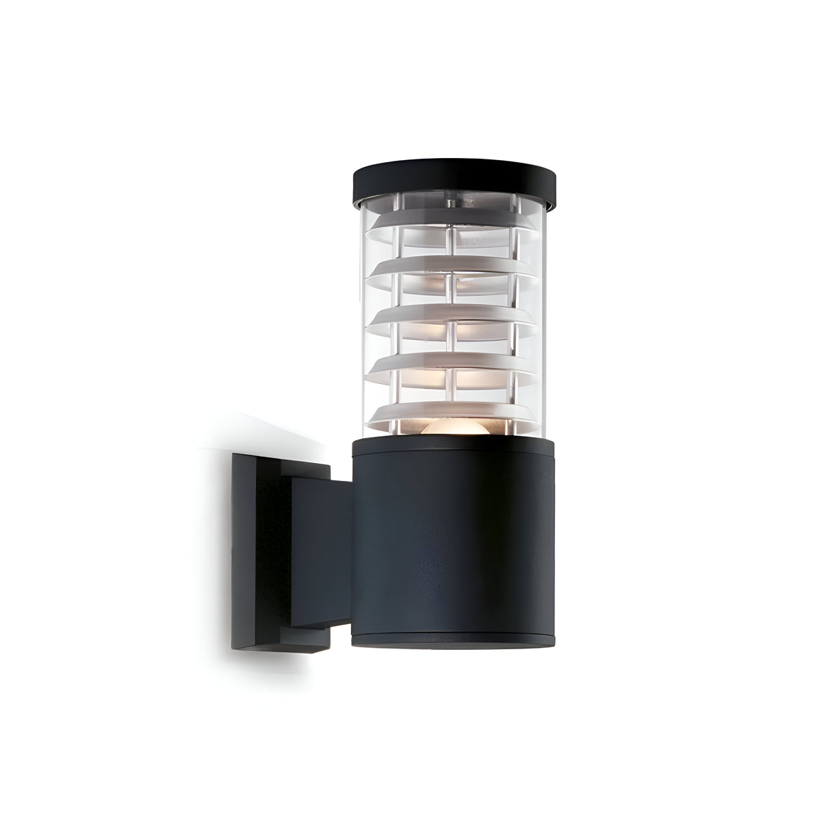 The Luminis Outdoor Wall Light - Black, showcasing a sleek cylindrical design and layered glass panels, is mounted on a white wall. Its weather-resistant properties allow it to emit a soft glow while seamlessly complementing the modern aesthetic.