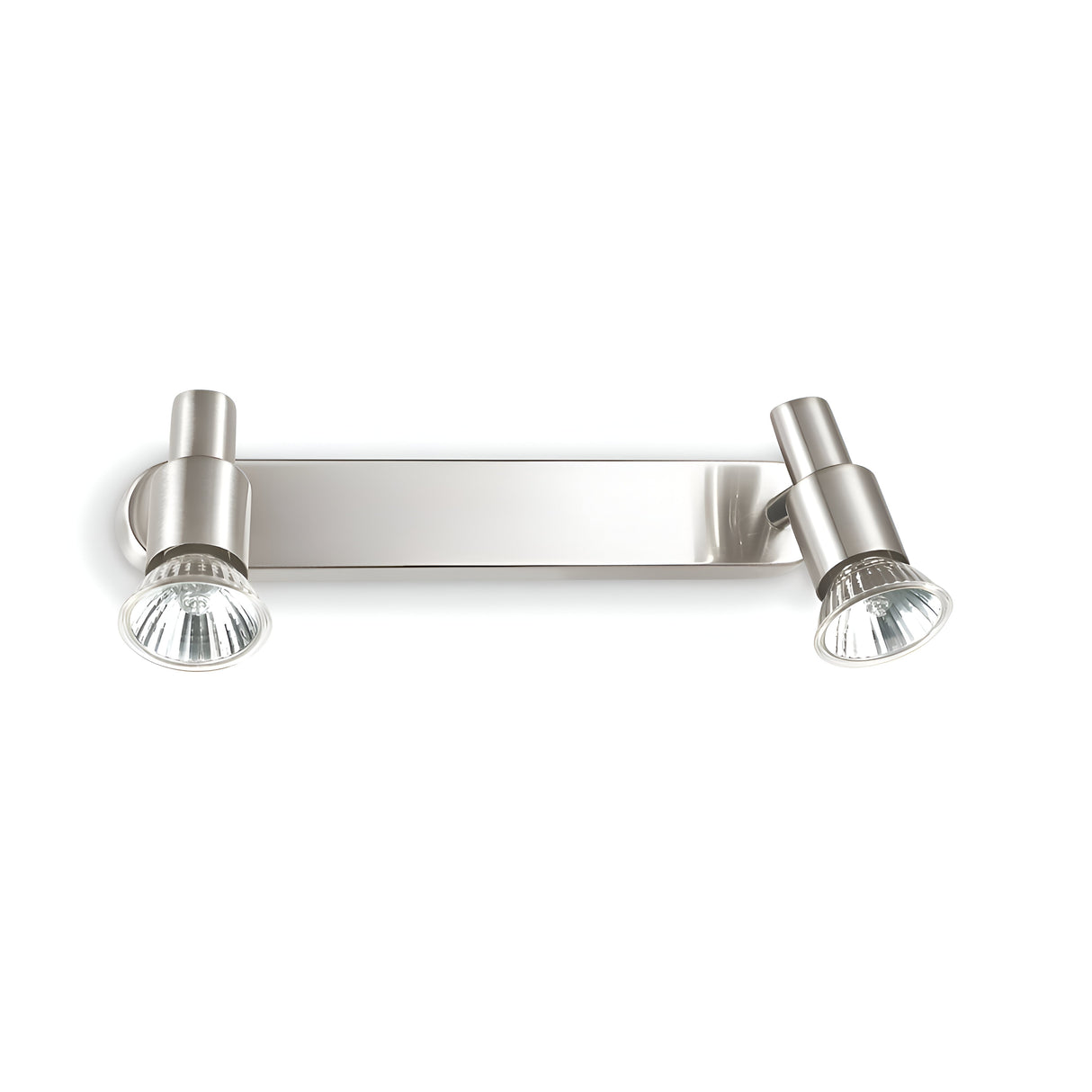 The Crest Twin Bar Spotlight - Nickel is a contemporary wall-mounted light fixture that boasts a sleek metallic finish. It comes with two adjustable spotlights equipped with GU10 bulbs, extending from a rectangular base for versatile lighting direction.