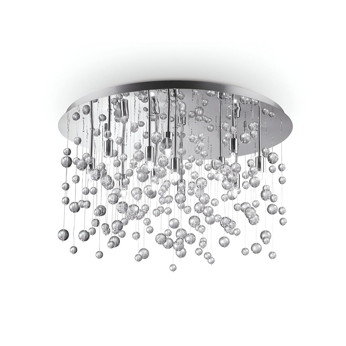 The Illusis 12 Light Glass Semi Flush Chandelier in chrome is a modern lighting masterpiece, boasting a circular metallic base adorned with numerous transparent glass spheres hanging at varying lengths, creating an elegant and shimmering appearance.