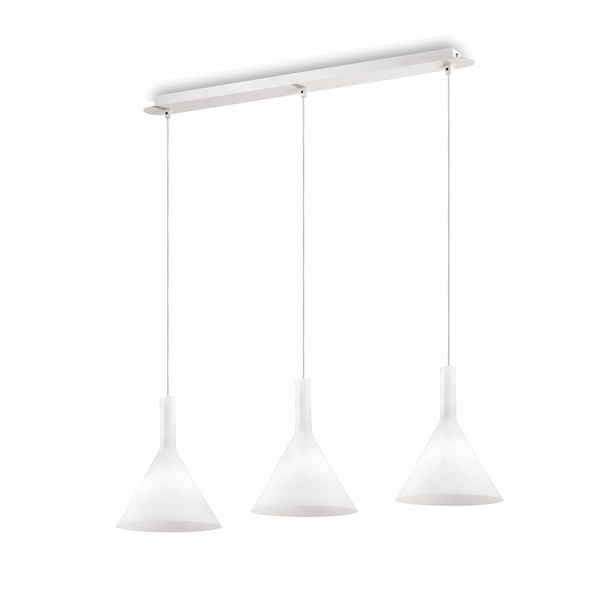 The Vesper 3 Light Bar Pendant - White boasts a minimalist design with three cone-shaped frosted glass shades. Each shade is suspended from adjustable cables, all attached to a rectangular white ceiling mount, resulting in a sleek and modern lighting fixture.