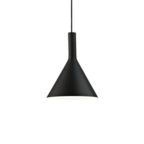The Vesper 1 Light Pendant - Black showcases minimalist design with its black cone-shaped shade and elegant, adjustable-length cables. It hangs elegantly against a white background, providing a striking balance of form and function.