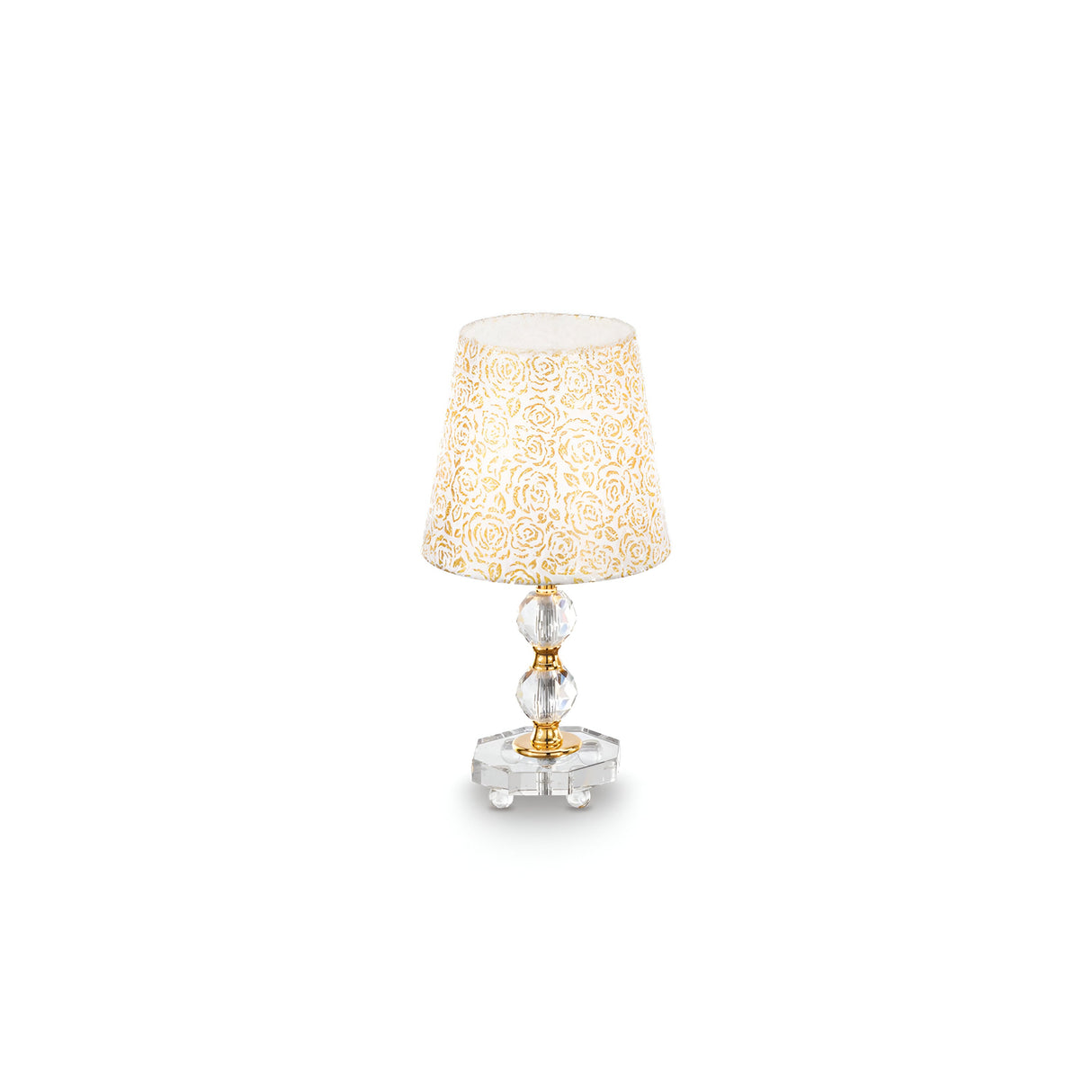 The Princess Small Crystal Table Lamp - Gold features an elegant floral-patterned, cream-colored shade. Its ornate, translucent base is highlighted by gold accents and crystal-like elements, set off beautifully against a refined gold metal frame on a pristine white background.