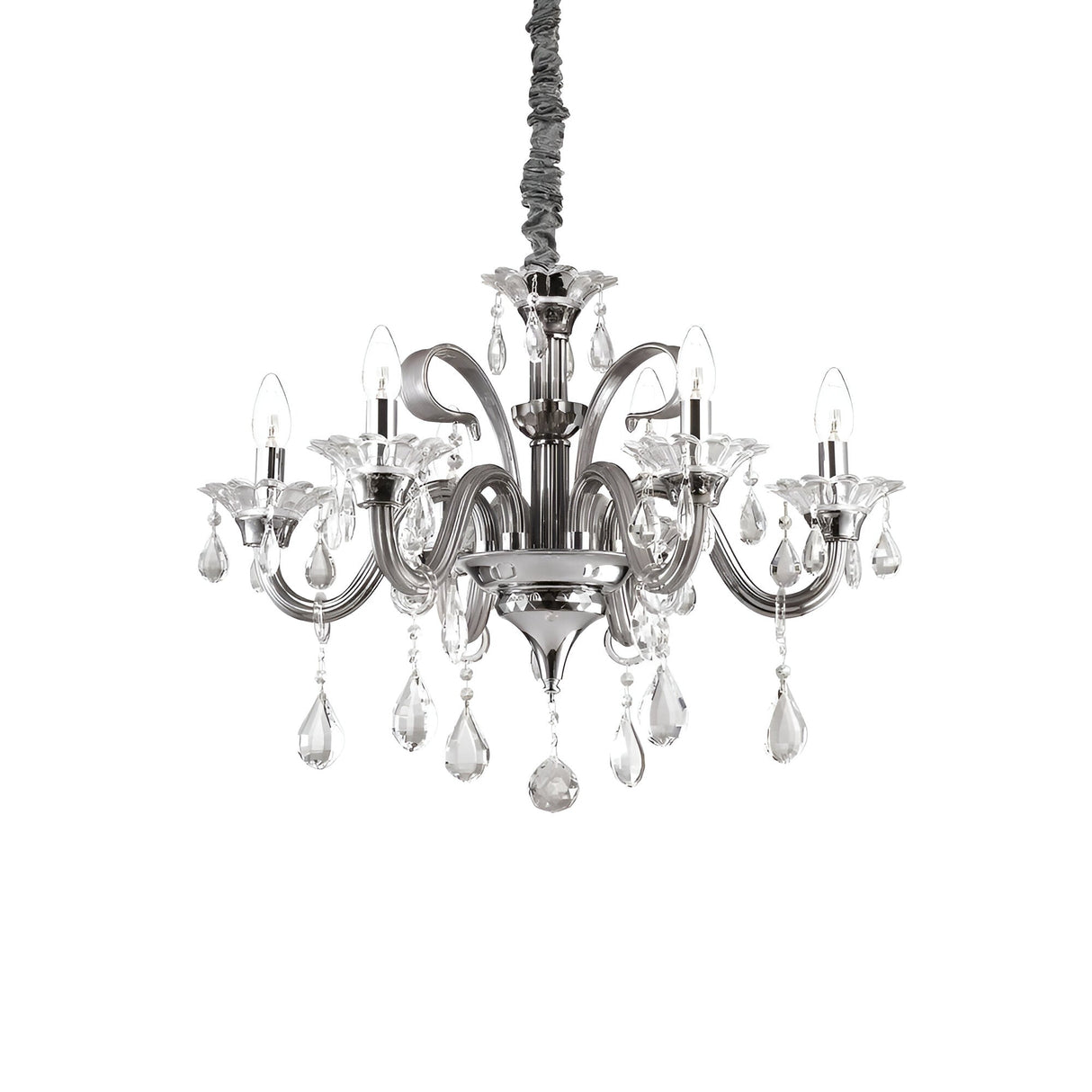 Featuring a polished metal frame and candle-shaped bulbs, the Vivid Crystal 6 Light Chandelier - Ivory showcases multiple curved arms adorned with hanging crystal ornaments, effortlessly adding sophistication to any luxury decor.