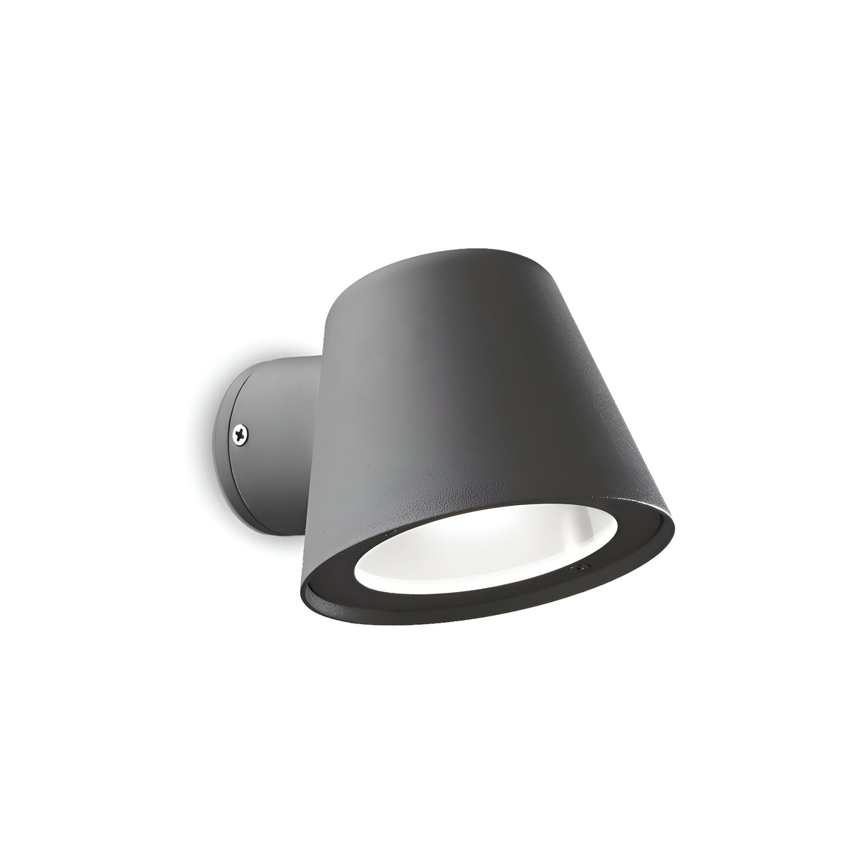 The Quasar Outdoor Wall Light - Anthracite boasts a modern, cylindrical black shade that angles downward, mounted on a circular base. This minimalist fixture, with an IP43 rating, is ideal for contemporary interiors.