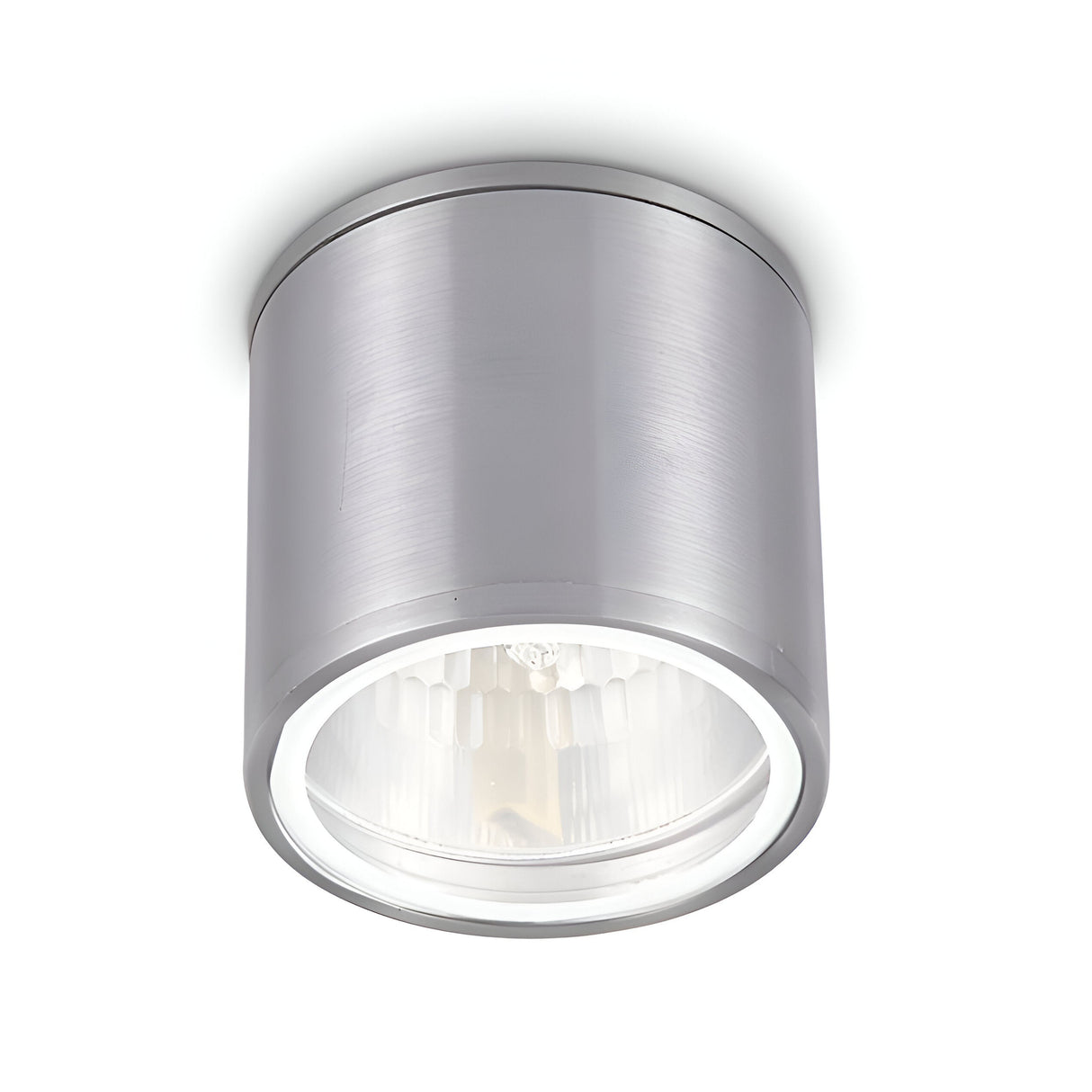 Introducing the Solar Downlight - Chrome: a cylindrical ceiling light fixture crafted from brushed metal, featuring a striking chrome finish and a glass cover. It comes with an inner reflective surface designed to diffuse light evenly. With its modern, minimalist design, it's perfect for contemporary spaces and boasts an IP44 rating for enhanced durability.