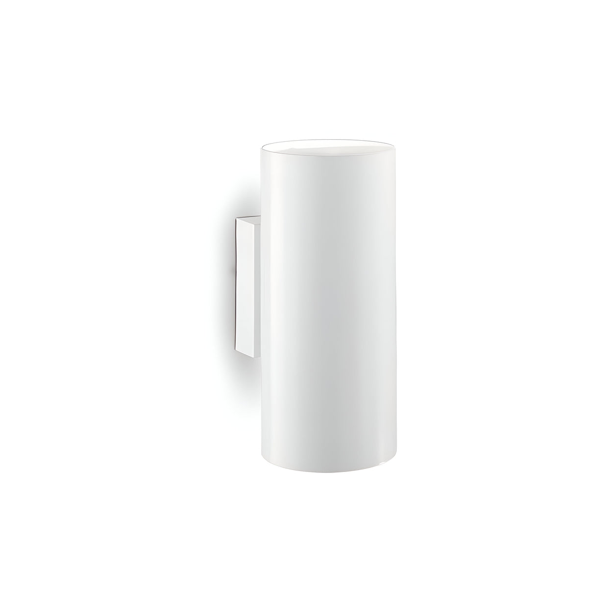 The Noctis 2 Light Wall Light - White features a minimalist cylindrical design with a matte white finish, mounted on a simple rectangular base, bringing a clean and modern touch to the decor.