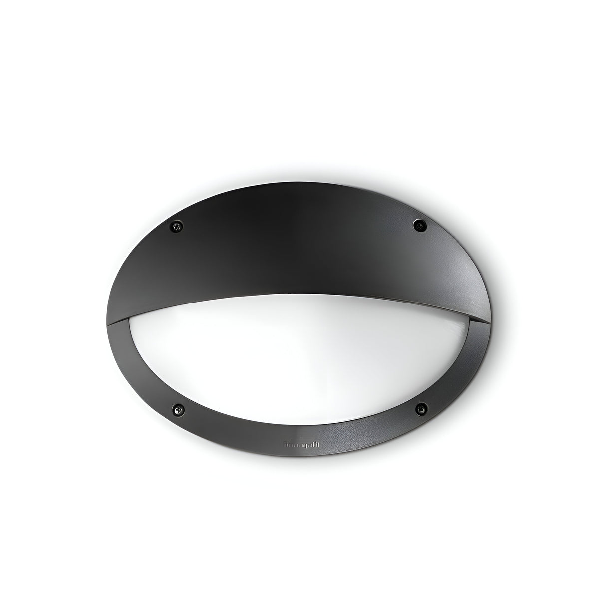 The Clio LED Eyelid Bulkhead in black features a black, oval-shaped design with a frosted glass diffuser, making it ideal for outdoor lighting. This water-resistant fixture boasts a sleek, modern look and is securely mounted with four visible screws on a white wall.