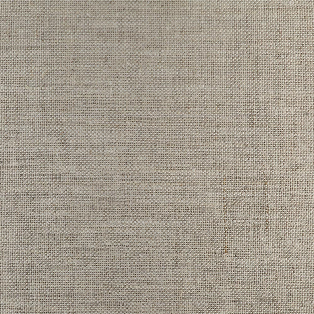 Close-up of a natural linen fabric texture, representing the woven shade material used on the Brenley Table Lamp in brushed chrome.