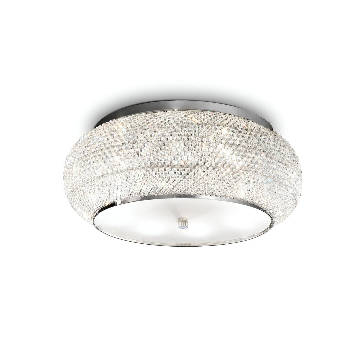 The Harbor 10 Light Crystal Flush - Chrome is a contemporary ceiling fixture with a circular design that showcases a dense array of sparkling crystals on its metal frame, creating a luxurious, shimmering effect. It mounts flush to the ceiling and is enhanced by a smooth, frosted glass underside.