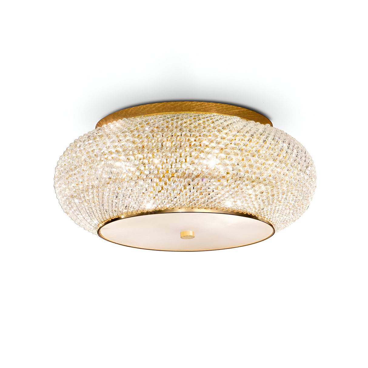 The Harbor 10 Light Crystal Flush - Gold features a modern circular design, complete with a golden base and a textured crystal-like surface that emits a warm glow. This gold ceiling light boasts a smooth, round bottom plate accentuated by a small central knob for an elegant touch.
