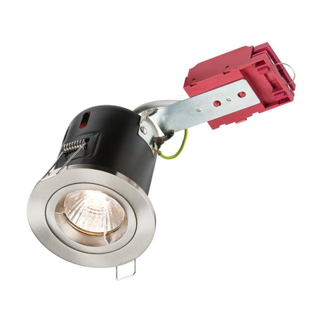 The Fixed Fire-Rated Downlight - Brushed Chrome showcases a modern design with its black casing and red wiring component. Highlighted at an angle, this recessed ceiling spotlight features a brushed chrome trim and offers adjustable functionality. It is both GU10 fire-rated and insulation compatible, ensuring enhanced safety.
