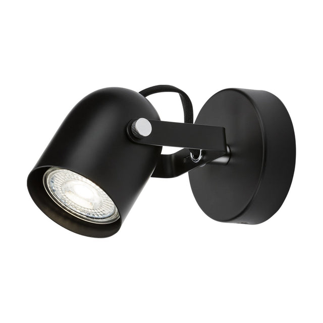 The Single Adjustable Spotlight - Matt Black is a contemporary GU10 wall-mounted fixture with a cylindrical lamp head and an adjustable arm. Its matte black finish enhances the sleek design, providing bright light from a clear bulb, ideal for directional illumination in indoor areas.
