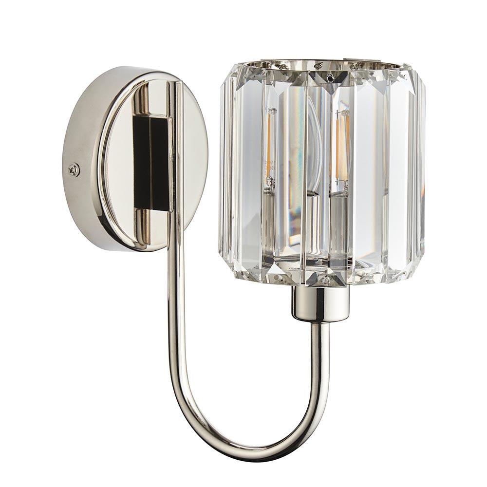 Endon Clementine wall light in nickel with a curved plated metal arm, round backplate, and faceted clear crystal glass shade housing an E14 bulb.