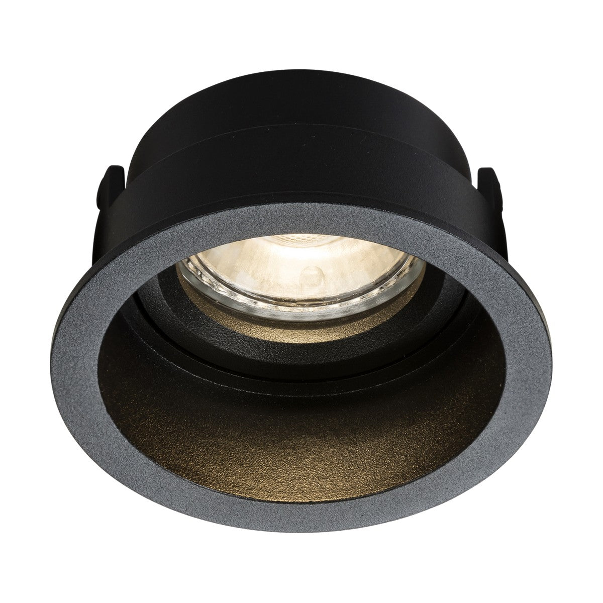 The Dipa Single Fixed Recessed Round Downlight in black showcases a visible round bulb elegantly placed within a sleek circular frame, making it perfect for subtle lighting in architectural designs. With its warm glow and matte finish, this fixture is designed for convenient installation using GU10 light sources, thanks to its two side clips.