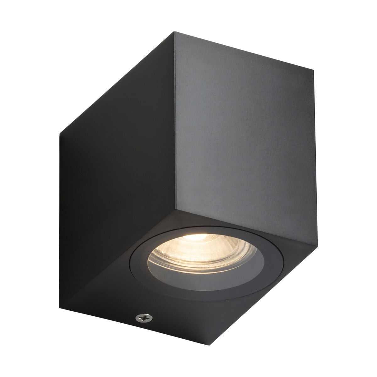 The Alana Outdoor Single Square Wall Light in black is affixed to a surface, featuring a circular GU10 bulb. This IP65-rated light is switched on, casting a warm glow. With its corrosion-resistant construction and modern, minimalist design, the fixture gives the impression of being made of metal.