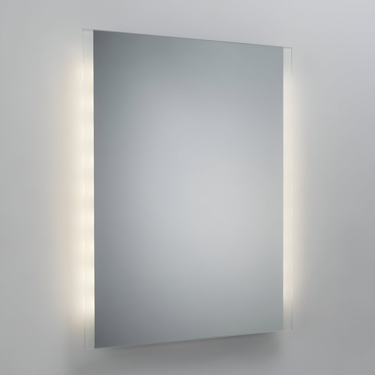 A 60x45cm LED Edge Lit Battery Bathroom Mirror adorns the light gray wall, with its vertical LED lights on both sides casting a gentle glow around the edges.