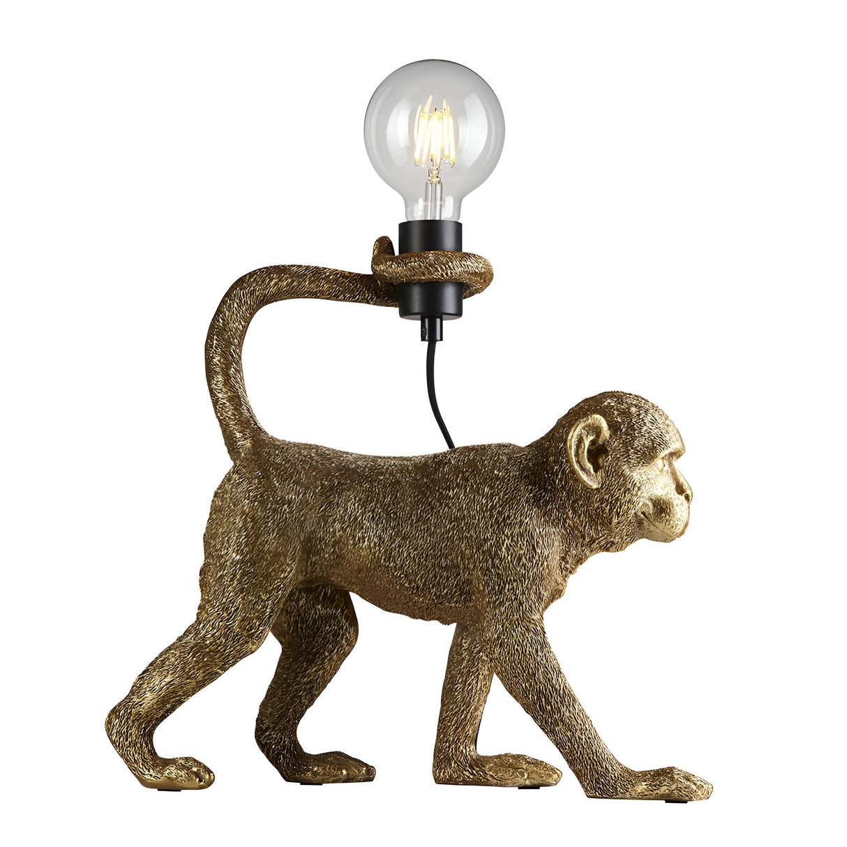 Endon Belvoir table lamp shaped as a walking gold resin monkey holding an exposed filament bulb with its tail, shown on a white background.