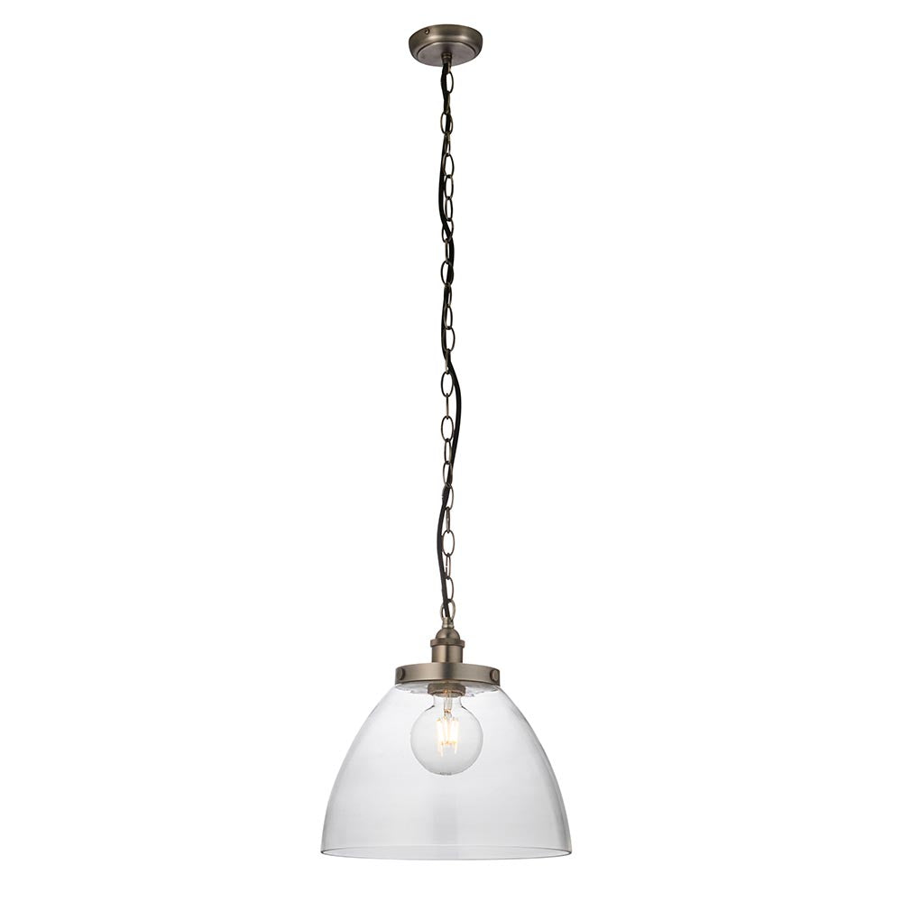 Wentworth Pendant in silver with a clear glass dome shade, exposed bulb, and knurled lampholder on a black chain, shown against a plain white background.