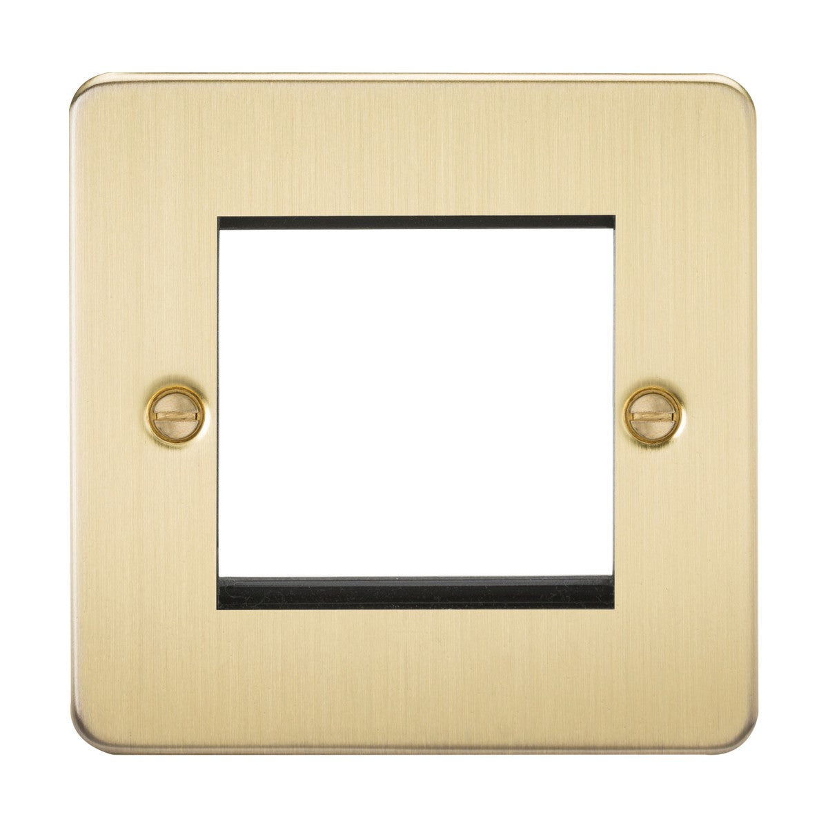 The 2 Gang Modular Faceplate - Brushed Brass (Flat Plate) has a square design with a central cutout for the switch and two visible screws on the left and right for mounting.