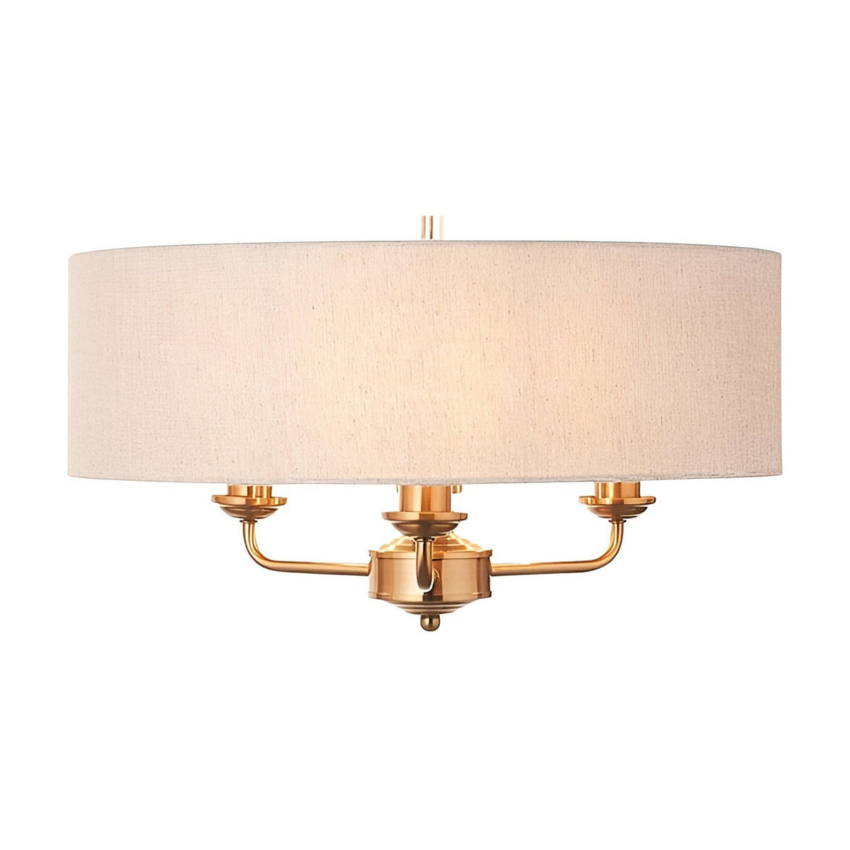 Brenley 3 Light Pendant in vintage brass with a natural linen drum shade, three exposed candle-style arms, and hanging chain, shown on a plain white background.
