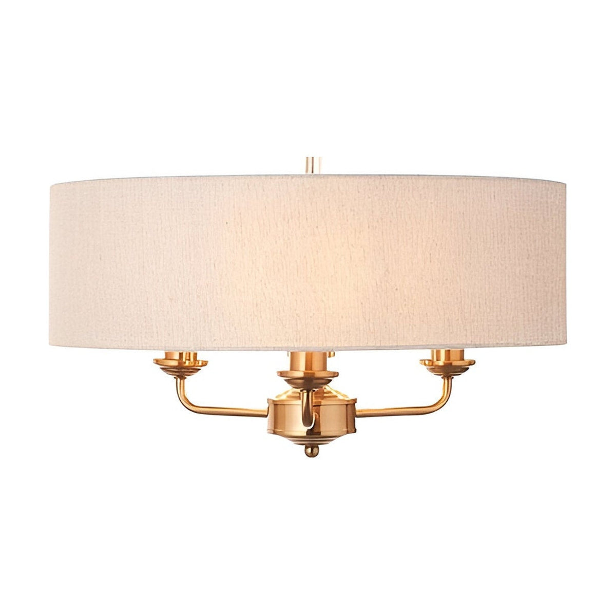 Brenley 3-light pendant with a natural linen drum shade on vintage brass plated metalwork and chain suspension, shown on a plain white background.