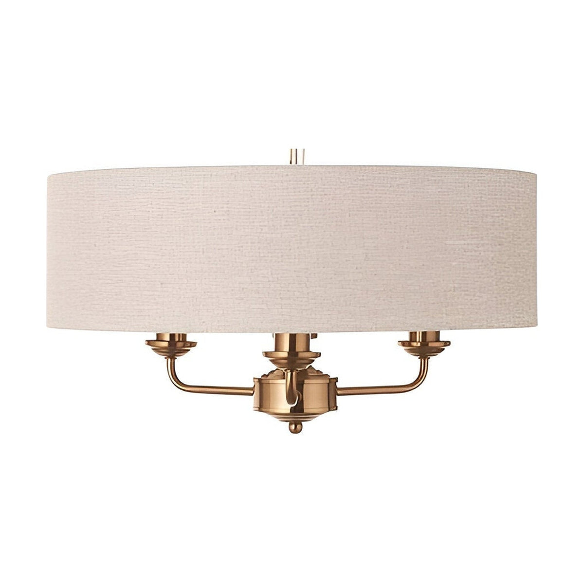 Brenley 3-light pendant with a natural linen drum shade on vintage brass metalwork and chain suspension, shown against a plain white background.