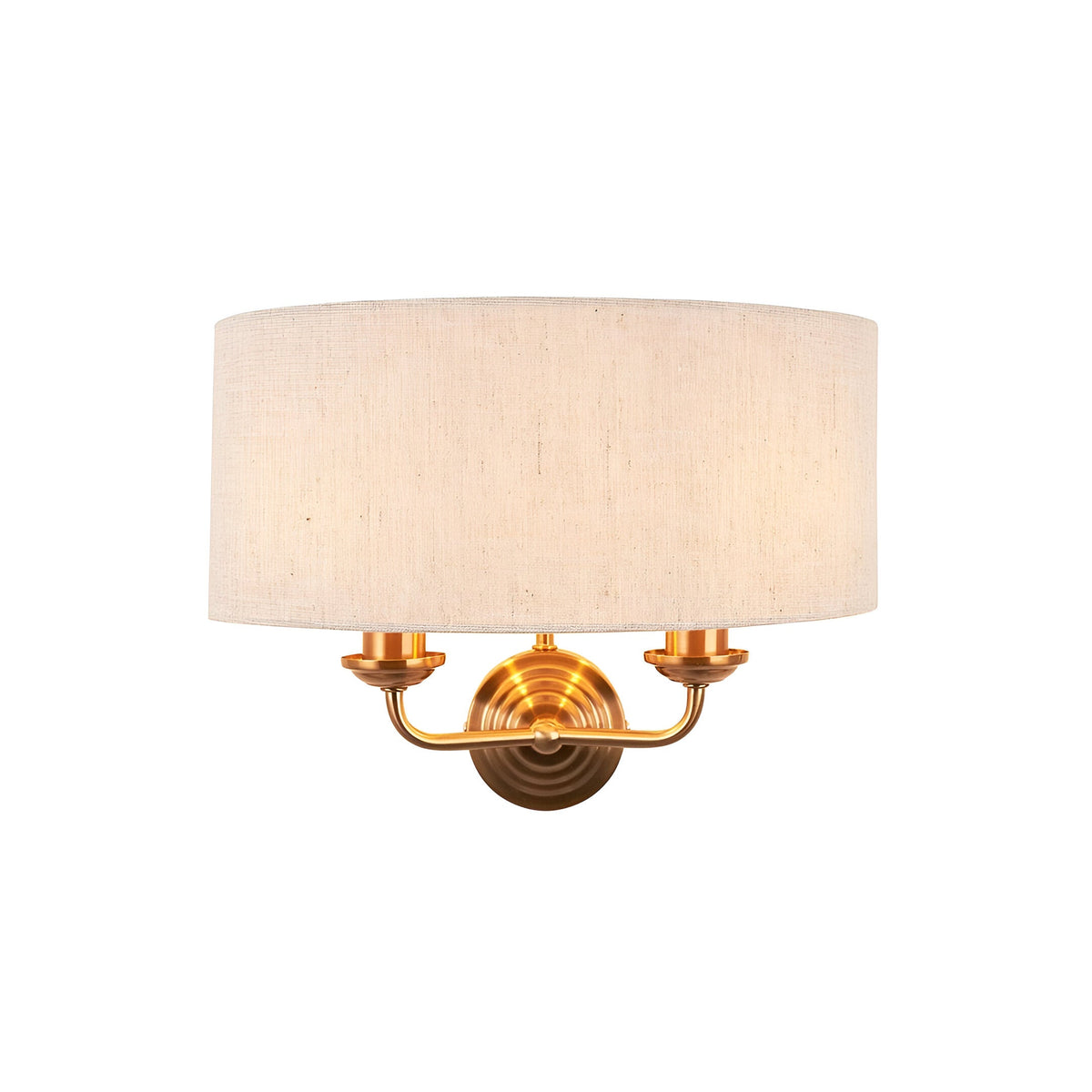Endon Brenley 2 light wall light with natural linen drum shade and vintage brass twin-arm fitting, shown on a plain white background.