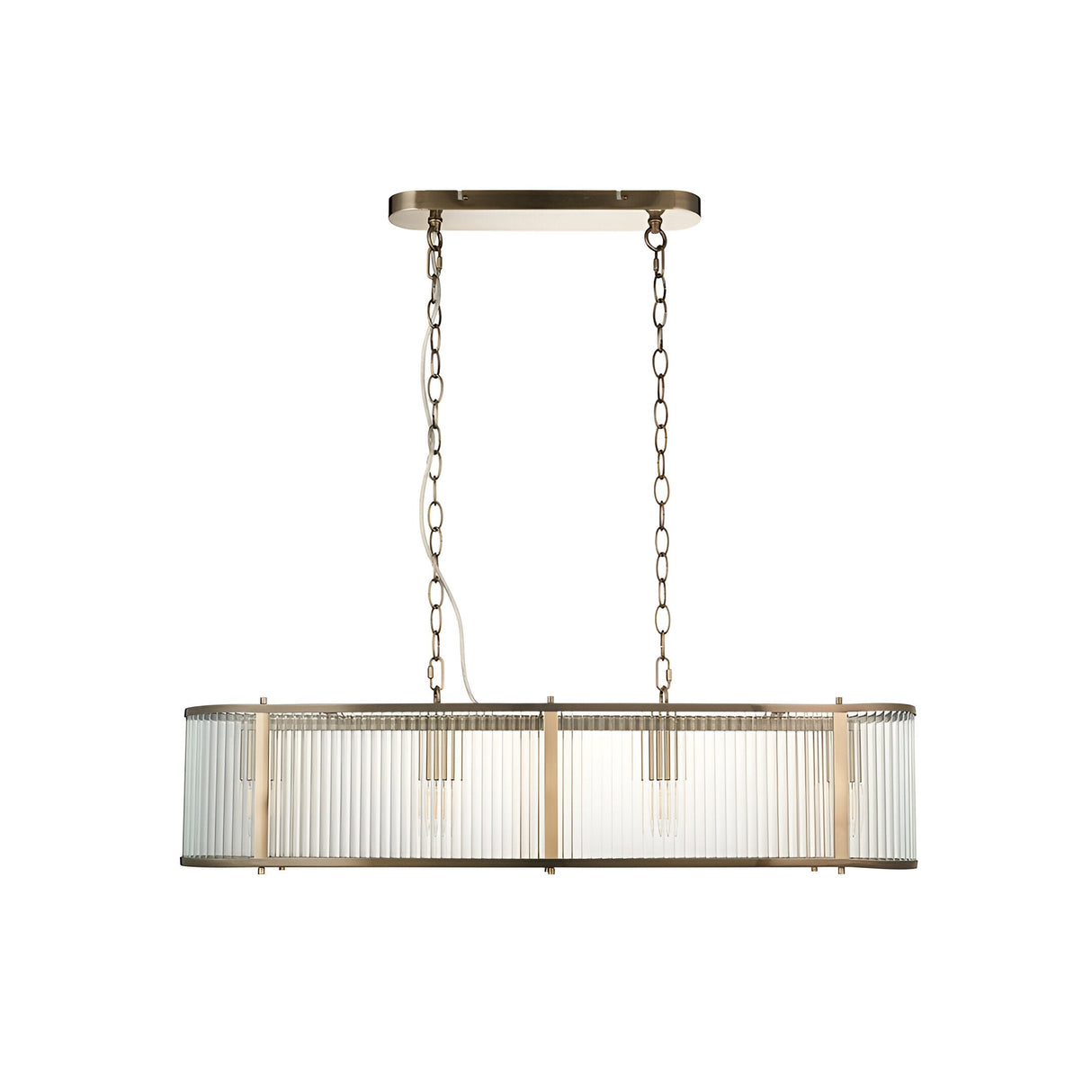 Rothbury 4 Light Linear Pendant in antique brass, with an oval bar holding ribbed glass panel shades, hung from twin chains on a plain white background.
