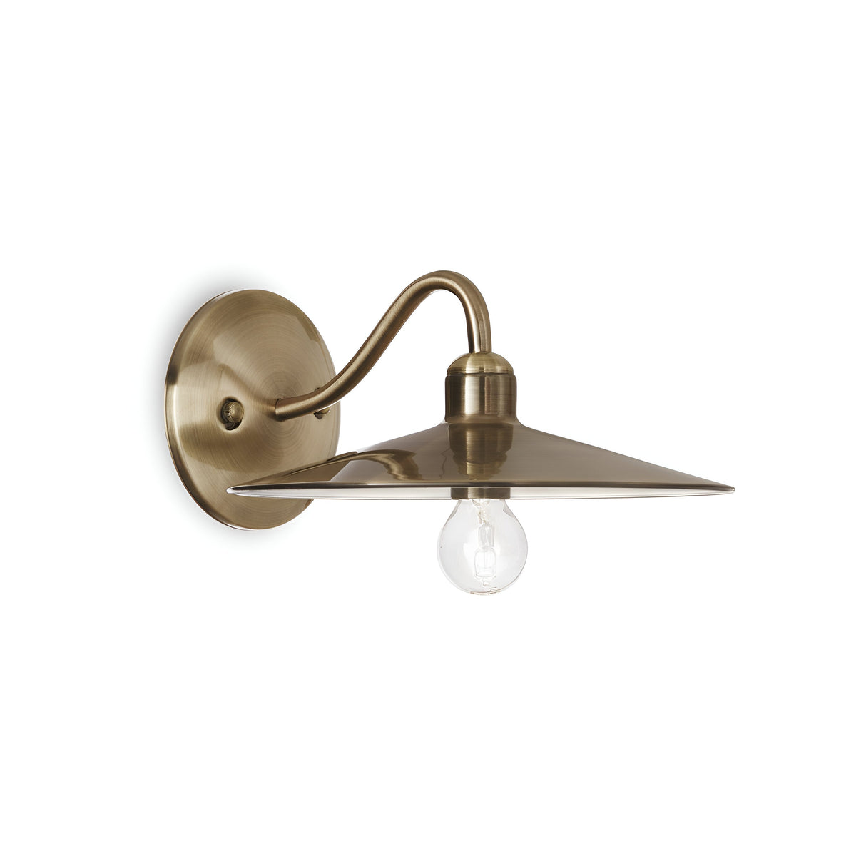 The Sienna Wall Light - Brass is a lighting fixture with a round backplate and a curved arm supporting a wide, conical shade. The visible bulb beneath the shade adds to its vintage charm, making it ideal for accent lighting.