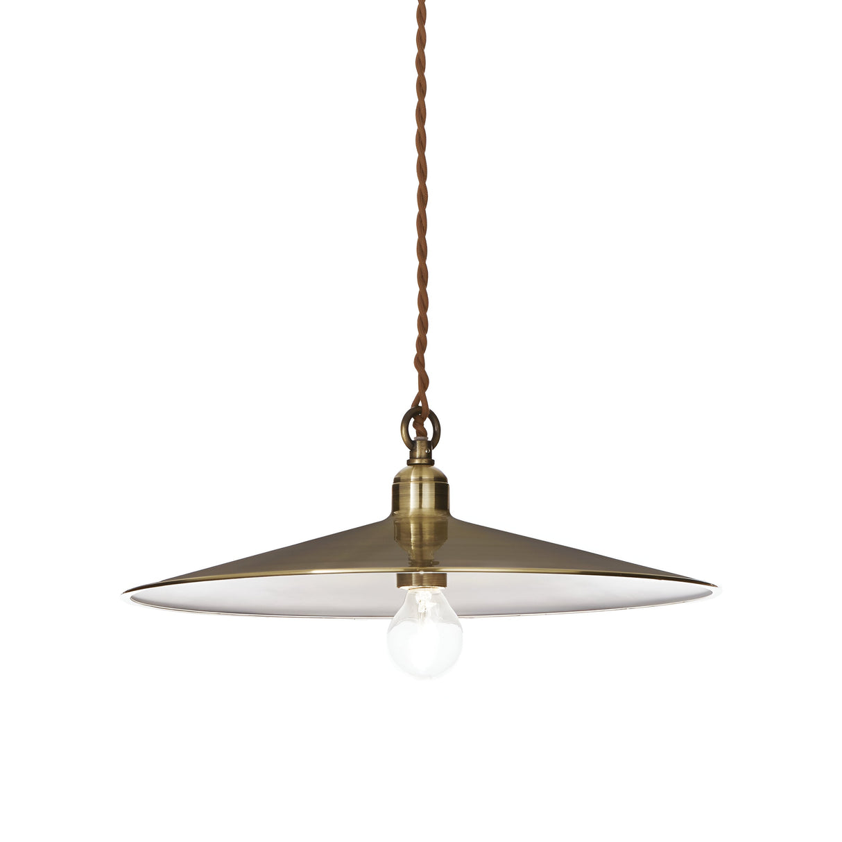 The Sienna 1 Light Pendant in brass features a conical shade suspended from a braided fabric cable, with a clear bulb visible beneath, highlighting its minimalist and industrial appearance with a hint of vintage charm.