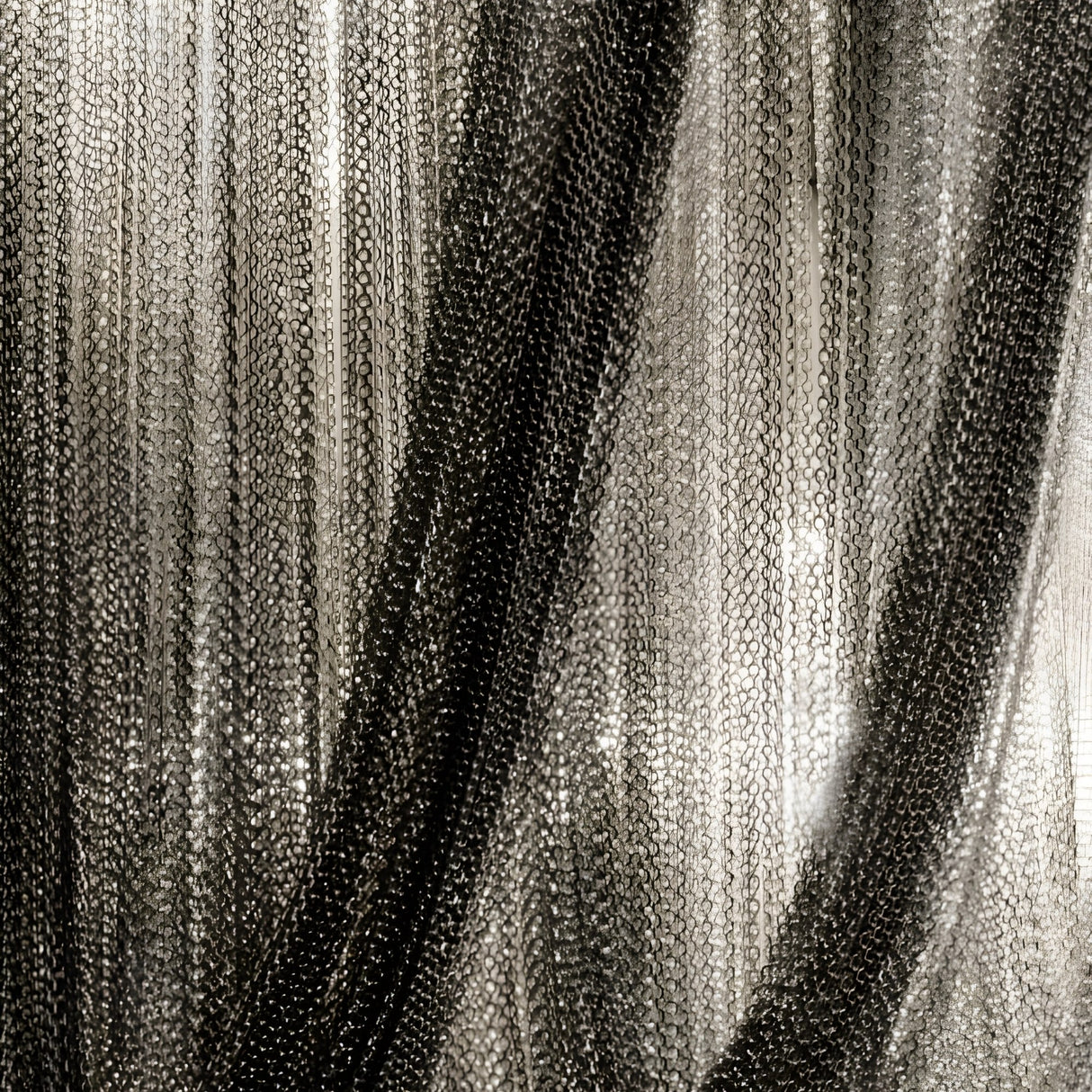 Close-up of the Mireya 6 Light Metal Chain Veil Wall Light in black, showing sheer, lightweight layers and vertical folds for a textured, translucent effect—ideal as a modern decor accent or eye-catching wall feature.