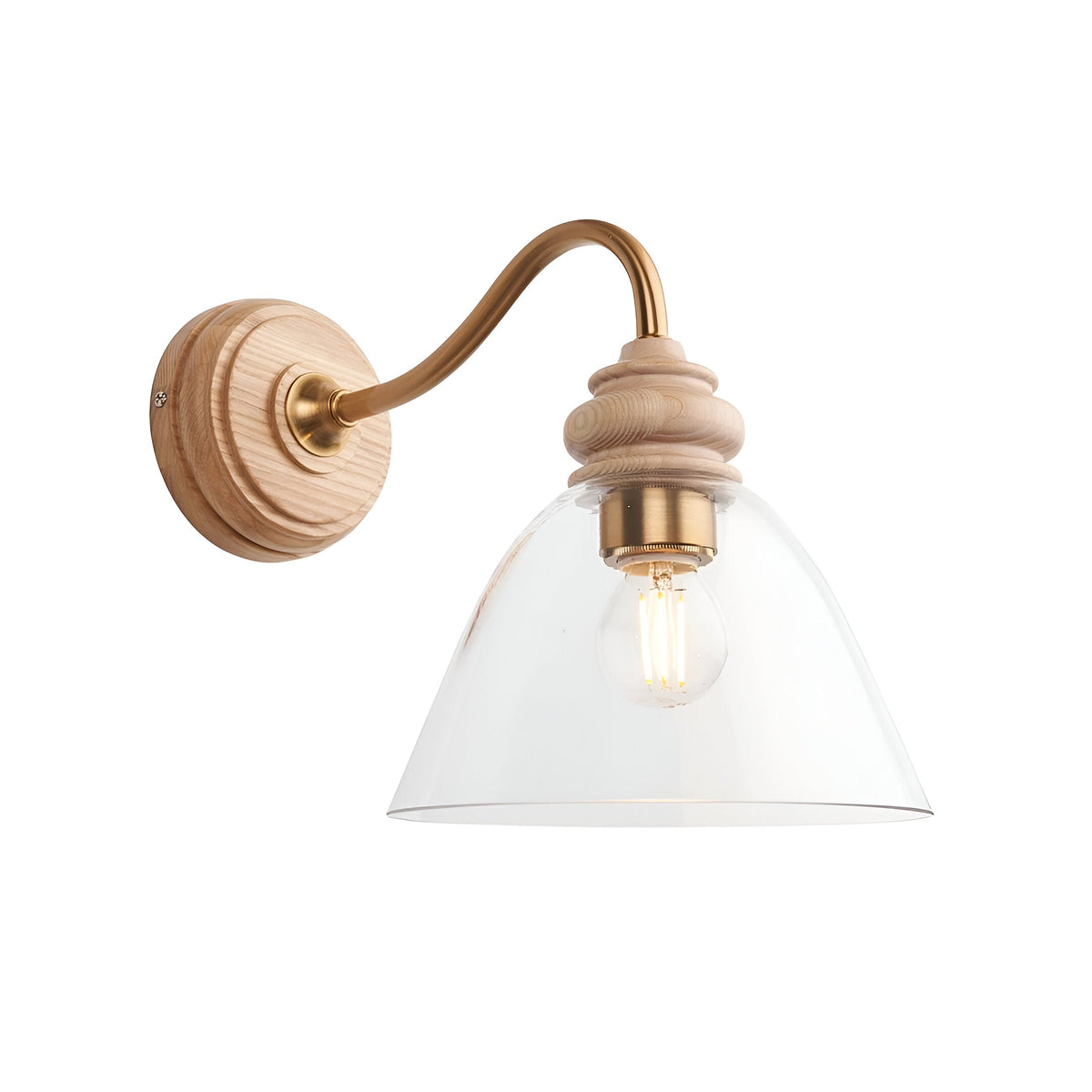 Endon Bevwick wall light with natural ash backplate and finial, aged brass gooseneck arm, and clear flared glass shade over an E14 bulb.