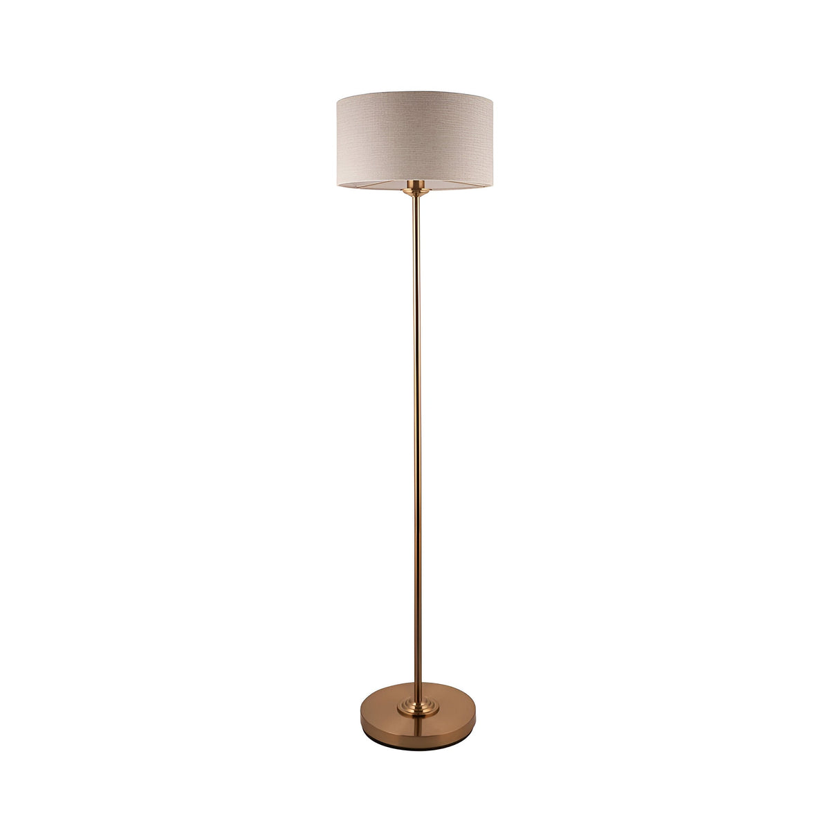 Brenley floor lamp in brass finish with a round base, slim stem, and drum-shaped fabric shade, shown on a plain white background.