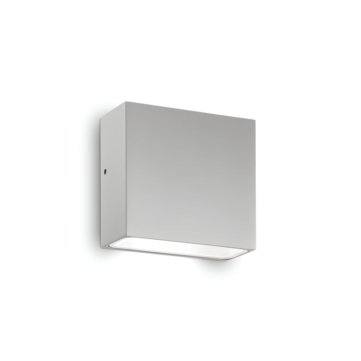 The Sparka-1 Outdoor Wall Light in grey provides a durable lighting solution with its minimalist square design and sleek brushed metal finish. It emits a soft light from the bottom and is mounted on a plain white wall.
