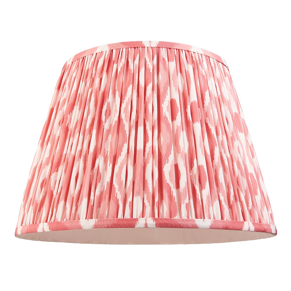 Endon Brackmont pendant shade in handmade pleated faux silk with coral pink Ikat print and taped edges, shown on a plain white background.