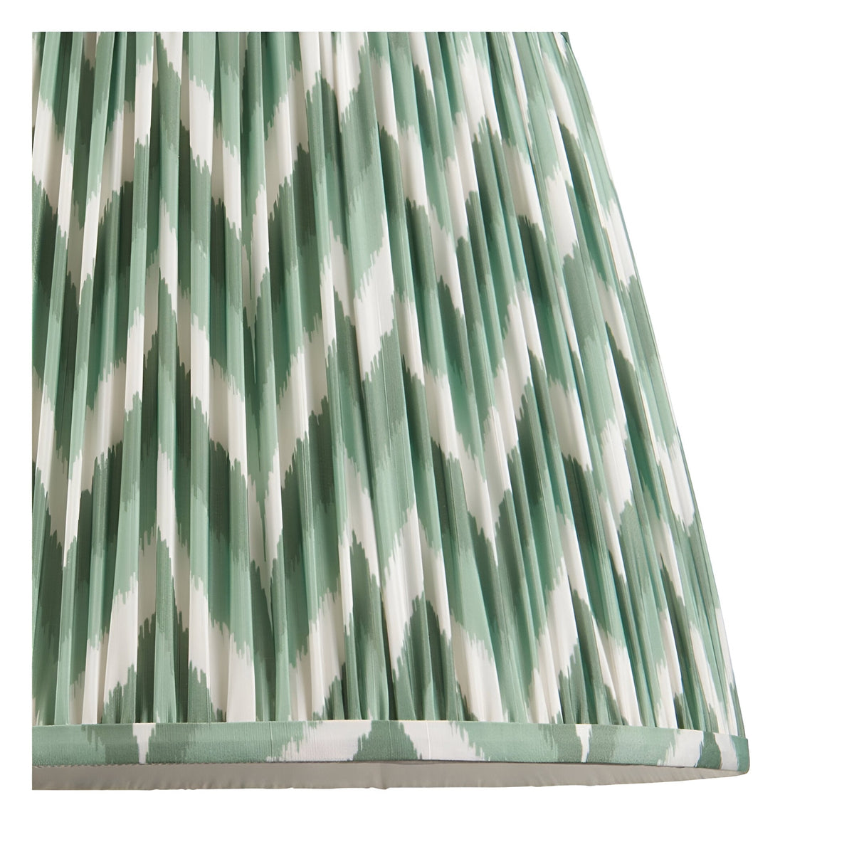 Close-up of the Brackmont Pendant's hand-pleated tapered fabric shade in green and white diamond pattern with taped edge detailing.