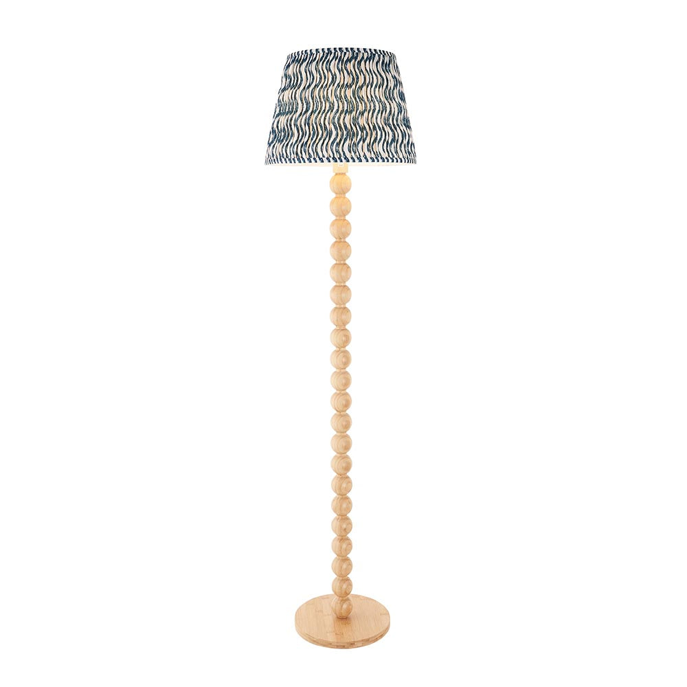Endon Ashwood floor lamp with stacked bamboo sphere base and tapered marlin blue Ripple pleated shade, shown on a plain white background.