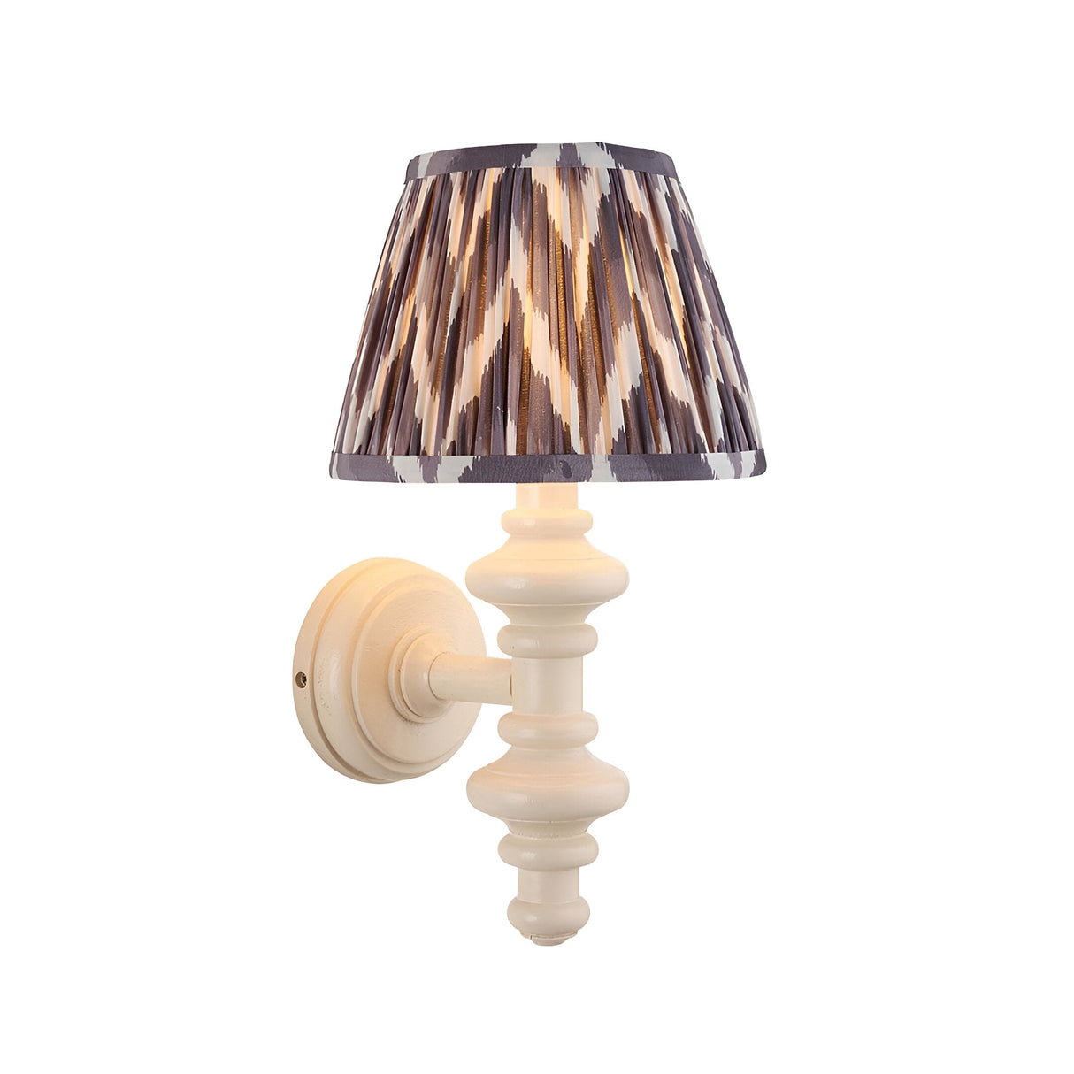 Endon Bevbury Zigzag wall light with turned almond white wooden spindle, brass B22 holder and grey zigzag pleated fabric shade on a white background.
