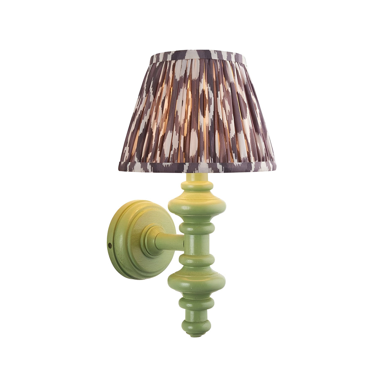 Bevbury Ikat wall light with a turned green spindle base, brass B22 lamp holder, and pleated grey-brown Ikat pattern shade, shown on a white background.