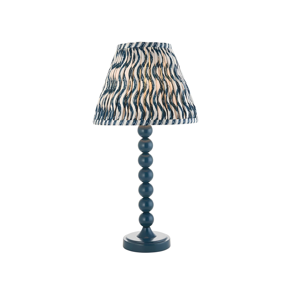 Brenleigh Ripple Table Lamp in blue, with a stacked-sphere gloss metal base and pleated wavy-print fabric shade, shown on a plain white background.
