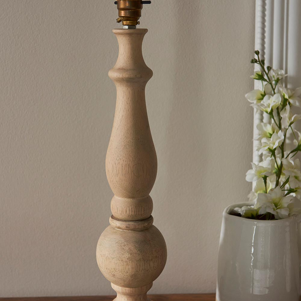 Endon Brenhurst table lamp base hand-turned from natural wood with turned baluster and ball detailing, topped with a brass B22 lamp holder.