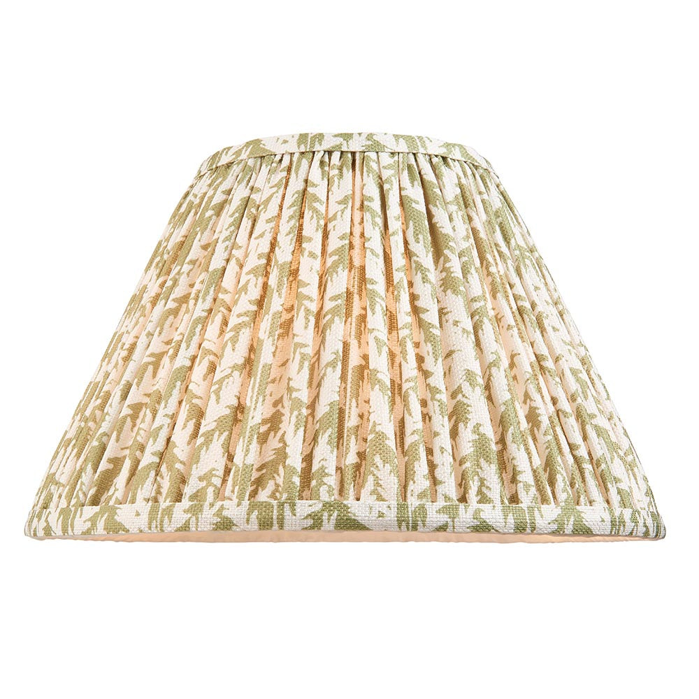 Endon Brenhurst table lamp shade in pleated faux linen with a green leaf print on a natural background, shown on a plain white backdrop.