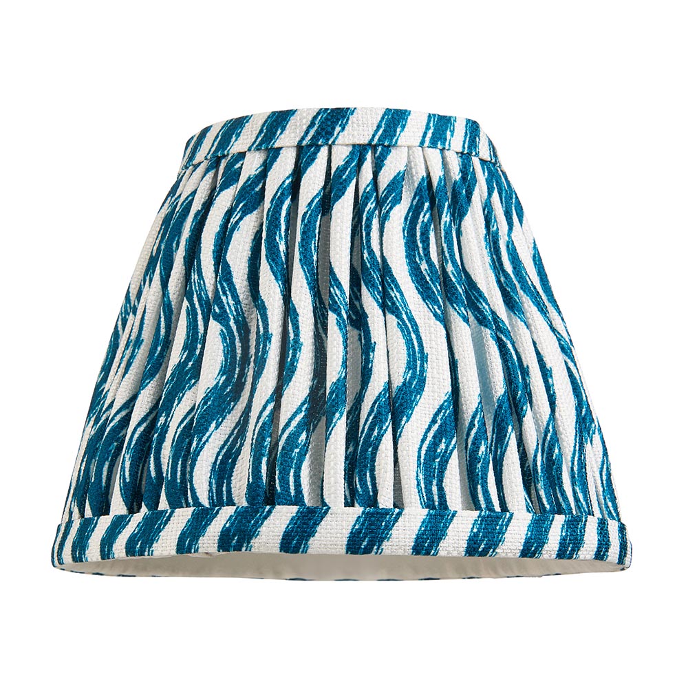 Ashstead LED Ripple Wall Light shade in pleated white and teal wavy-print fabric with brass gallery trim, shown on a plain white background.
