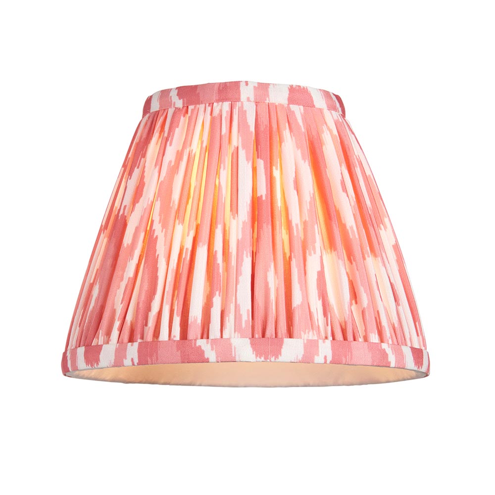 Endon Cranwick LED Ikat table lamp shade in coral pink and white pleated faux silk with digital ikat print, shown on a plain white background.