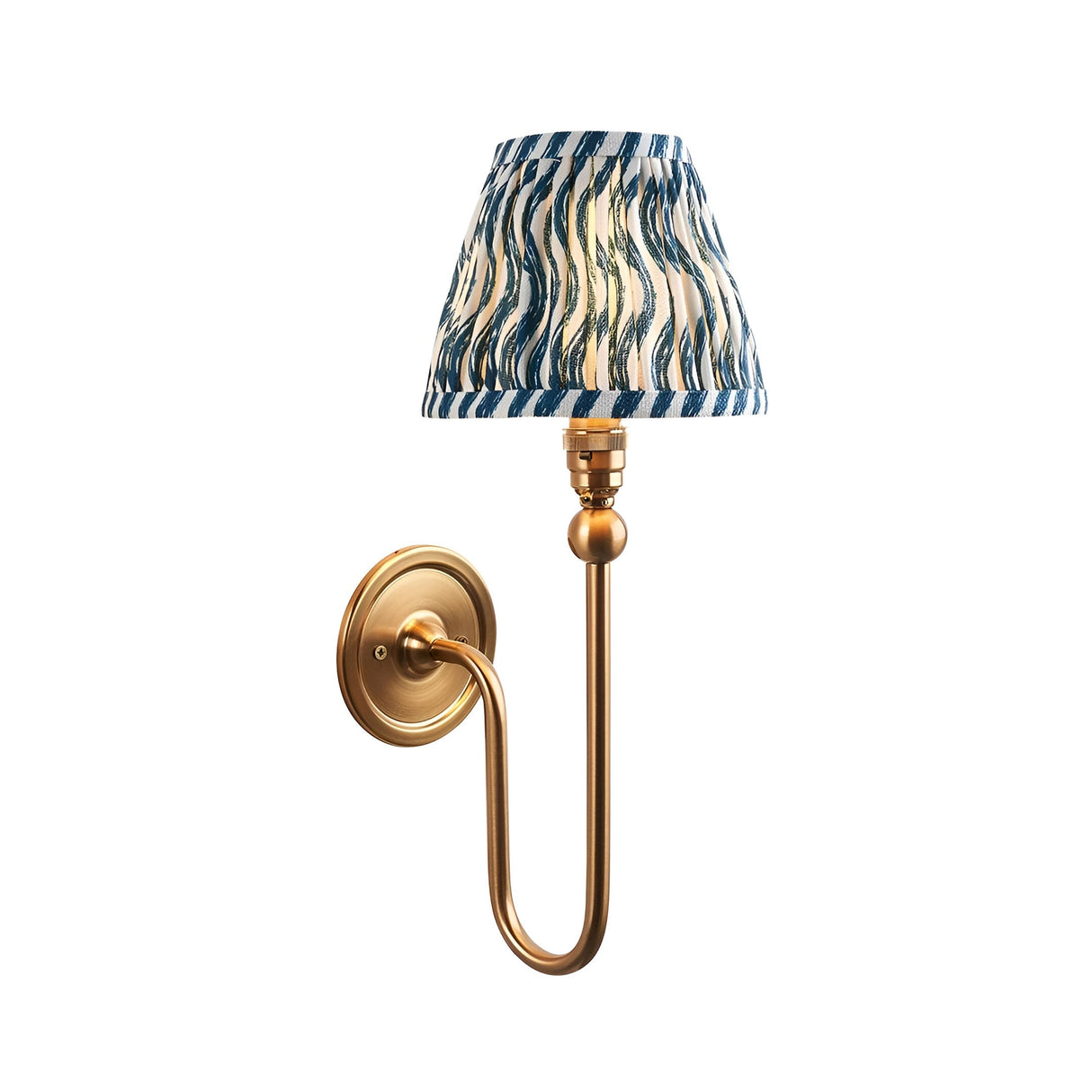 Endon Cliffleigh Ripple wall light in brushed aged brass with a tapered pleated marlin blue faux linen shade in a ripple print, on a white background.