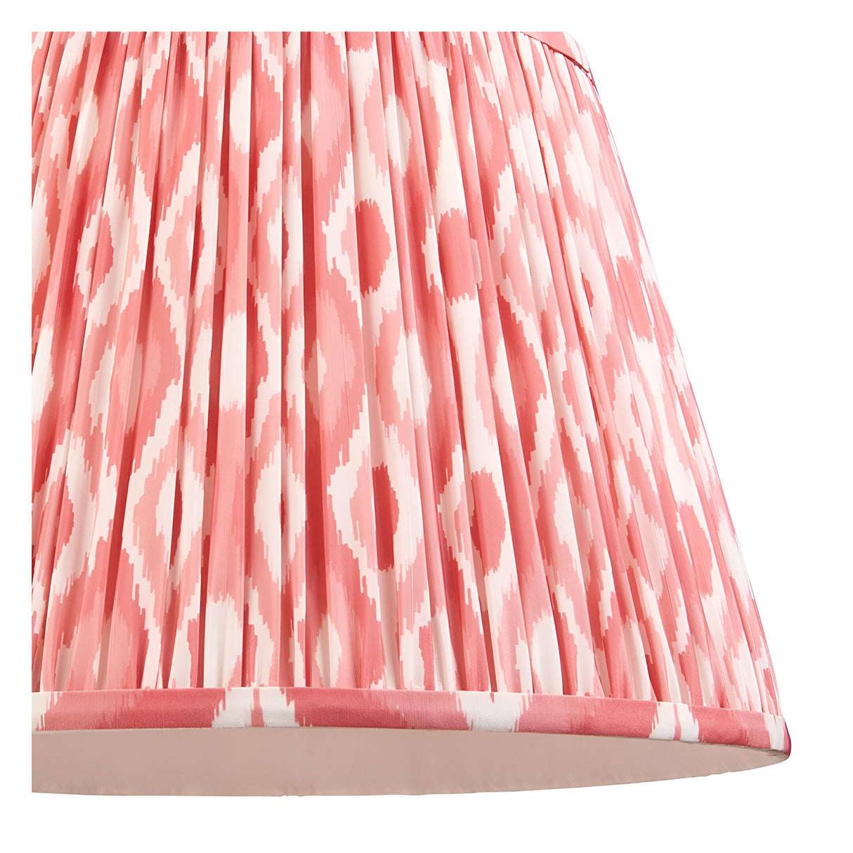 Endon Brackmont pendant shown in close-up, showing the handmade pleated faux silk tapered shade in coral pink Ikat print with taped edging.