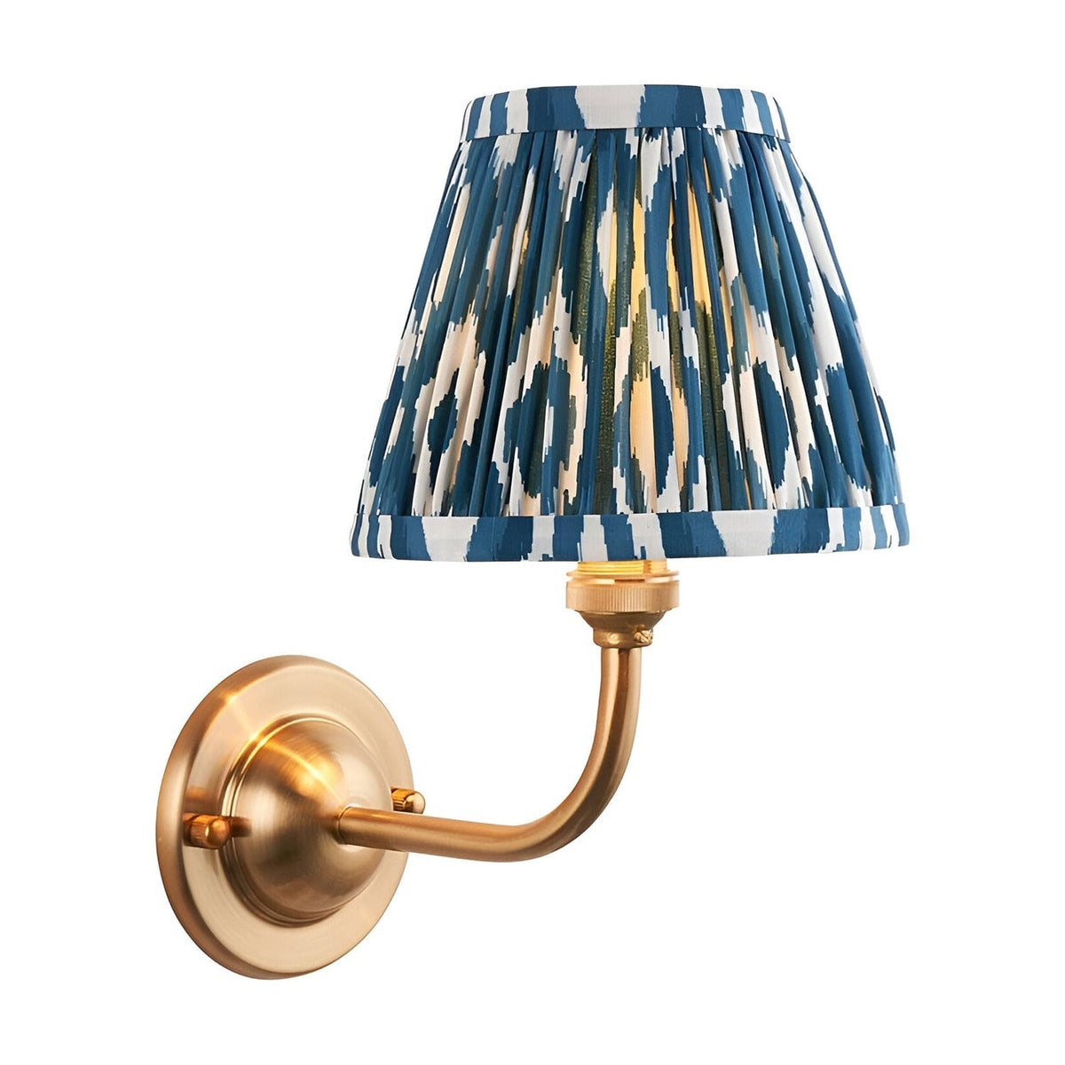 Endon Brackdale Ikat wall light with brushed aged brass curved arm and pleated blue and white ikat faux silk shade on a plain white background.