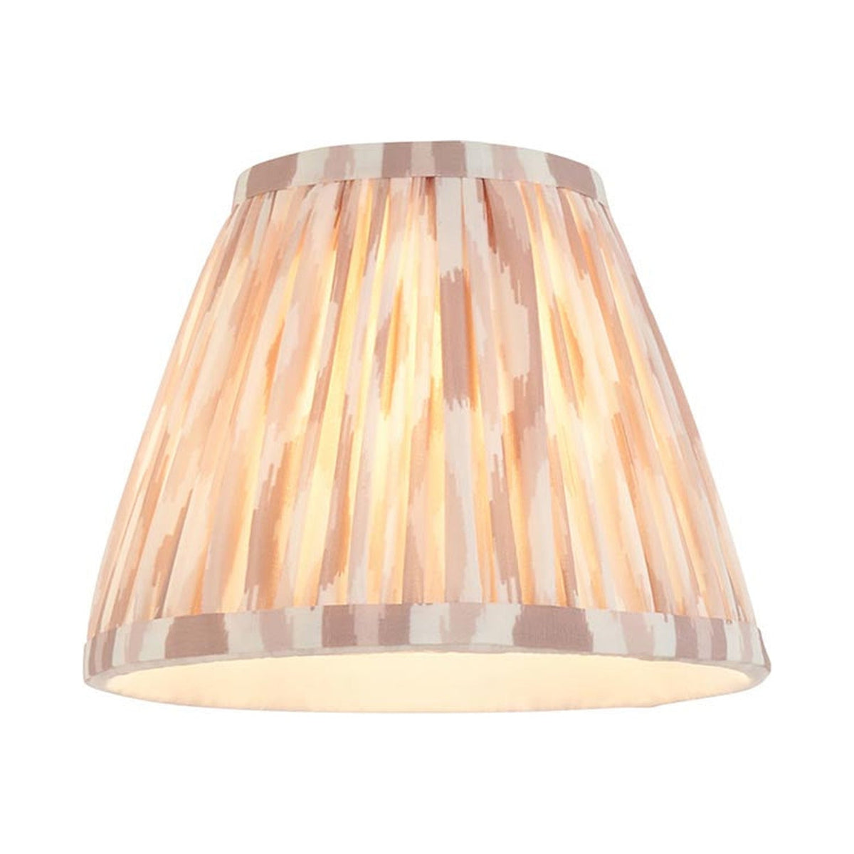 Endon Brackdale Ikat pleated tapered shade in natural faux silk with soft coral and cream Ikat print, shown lit on a plain white background.
